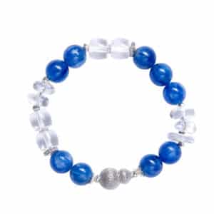 Blue kyanite and clear quartz bead bracelet with 925 sterling silver details on a white ceramic dish