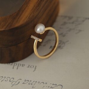 Golden Whisper gold-plated copper open ring with a 7mm natural freshwater pearl and sparkling accents