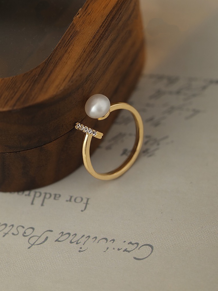 Golden Whisper gold-plated copper open ring with a 7mm natural freshwater pearl and sparkling accents